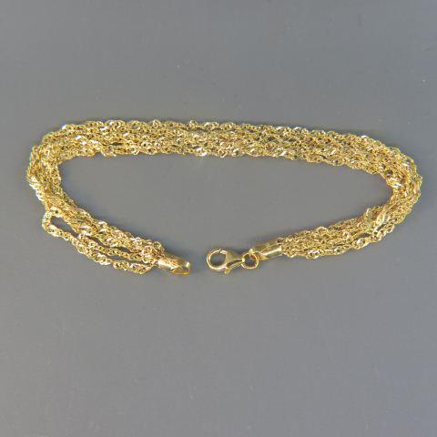 14K Gold Italian Bracelet,: five strand, 7" long, 2.8 grams.