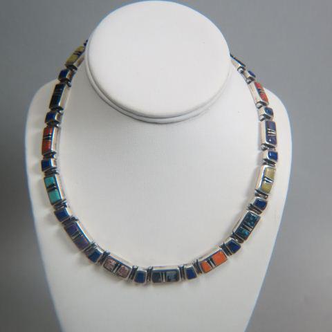 Sterling & Gemstone Necklace by Calvin B.,: various stones 3/8" wide, 22" long, 102 grams, signed.