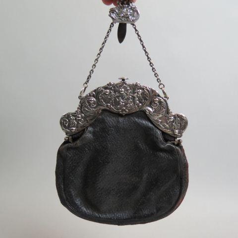 Gorham Sterling Victorian Handbag or Purse,: elaborate frame with figures in festive scene, chatelaine style hook and chain, leather bag part, monogram on back "Annie Garnett, Washington, DC".