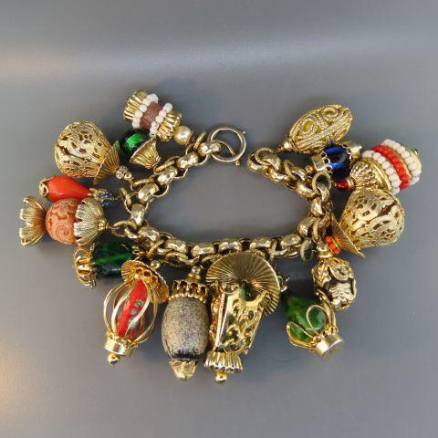 Napier Vintage Charm Bracelet with 15 Charms,: large and colorful with gold wash, mid-century, appears unused, from estate of Napier worker, up to 8" long....The company produced very little jewelry during the 1930s, focusing on its giftware lines