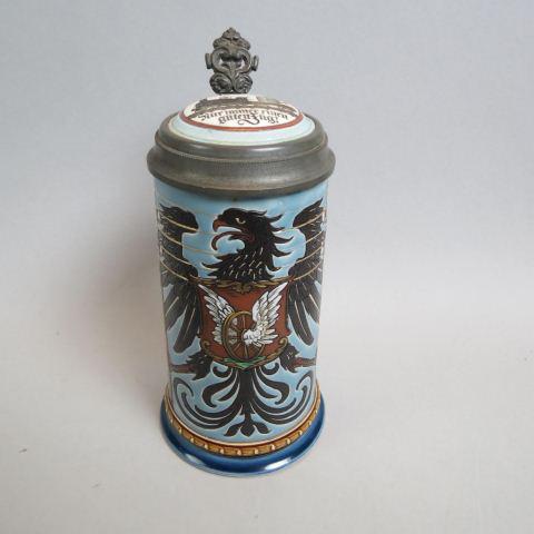 Mettlach Occupational Telegrapher Stein #2075,: etched pottery, eagle with crest, inlaid top with steam locomotive pulling a rail car with huge stein, 1/2 liter, 7 3/4" tall, excellent, scarce......There is further pride in German modernity: This s