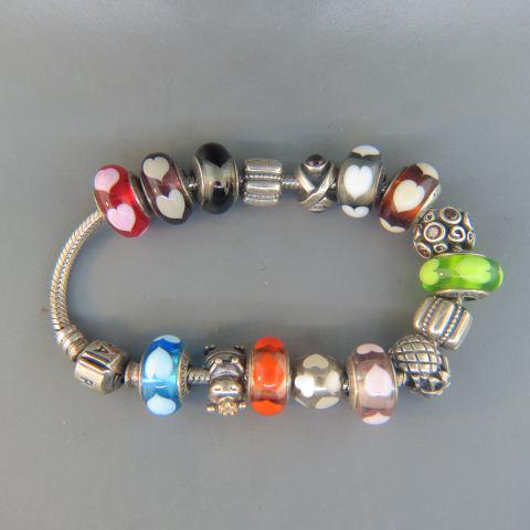 Pandora Sterling Silver Charm Bracelet,: cable style with 16 sterling and art glass charms, 8" long, 68 grams.