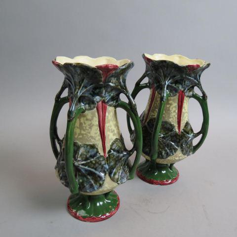 Pair of Amphora Art Pottery Vases,: Organic form, floral, handled, Art Nouveau, 10"....Amphora refers to some delicate pottery produced between 1894 and 1904 in the Turn-Teplitz region of Bohemia during the Art Nouveau times. These cera