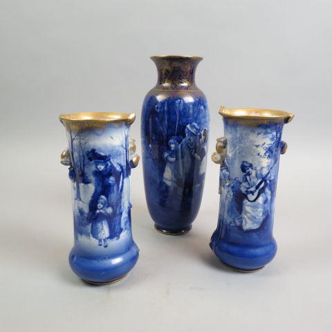 3 Royal Doulton Pottery Vases,: children in the woods, mother & daughter winter scene, and maiden with lute, all blue and white trimmed in gold, 11 1/2" tall one and 8 1/2" pair.