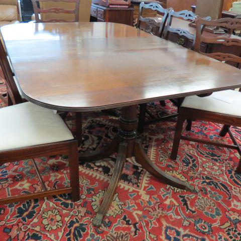 Mahogany Dining Table,: Duncan Phyfe style double pedestal base, 30" tall, 48" wid, 72" with leaf in, 58" without.