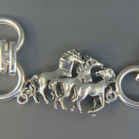Sterling Equestrian Style Bracelet "Three Horses",: 8" long, 48 grams.