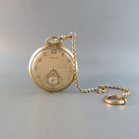Hamilton Man's Pocketwatch, Model 917,: 17 jewels, gold-filled case, 12 size, working, with gold-filled chain.