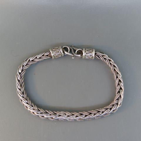 Sterling Silver Bracelet,: woven and rope design, fancy ends, 8 1/2" long, 5.5mm, 35 grams.