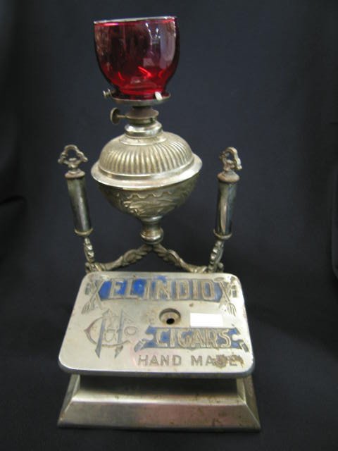 Victorian Cigar Advertising Counter Top display with: with cutter and oil lamp to light your cigars, "El Indio Cigars, Handmade", 12" tall, 7 1/2" wide.