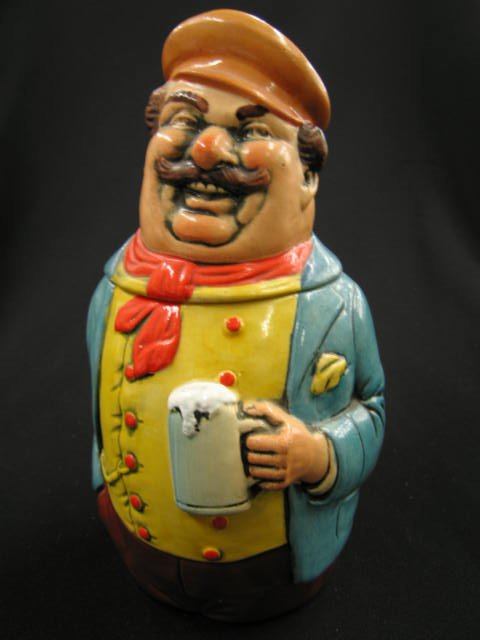 German Figural Pottery Character Stein, man holdin: man holding a stein, 8 1/2", excellent.