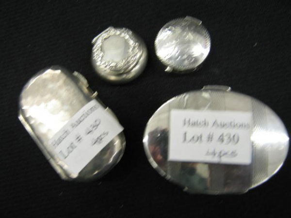 Lot of 4 Sterling Silver Boxes; oval, hand-hammere: oval, hand-hammered and pill size, from 1" diameter to 1 1/2" x 2 1/8".