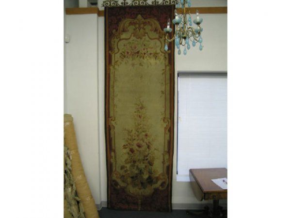 French Aubusson Needlepoint Tapestry, fine floral: fine floral on tan, red trim, 10'6" long, 41' wide, fancy bronzed hanger.