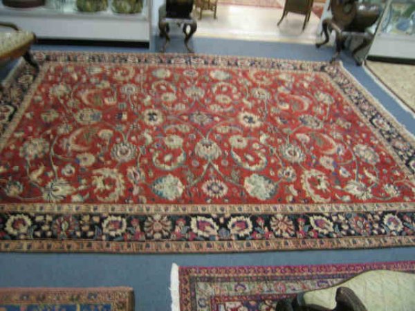 Tabriz Persian Handmade Rug, elaborate flowering v: elaborate flowering vine & animal decor on red field, 8'1" x 11'1".