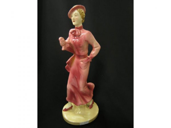 Art Deco Pottery Figurine of a Lady Strolling, si: signed Czechoslovakia, restoration at base.