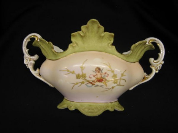 Imperial Carlsbad Austria Porcelain Planter, cher: cherub decor, handled.