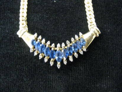 Sapphire & Diamond Necklace, marquise blue gems t: marquise blue gems totaling 1.70 carats, .20 carats, 14k yellow gold, 18" long with appraisal of $1650.00