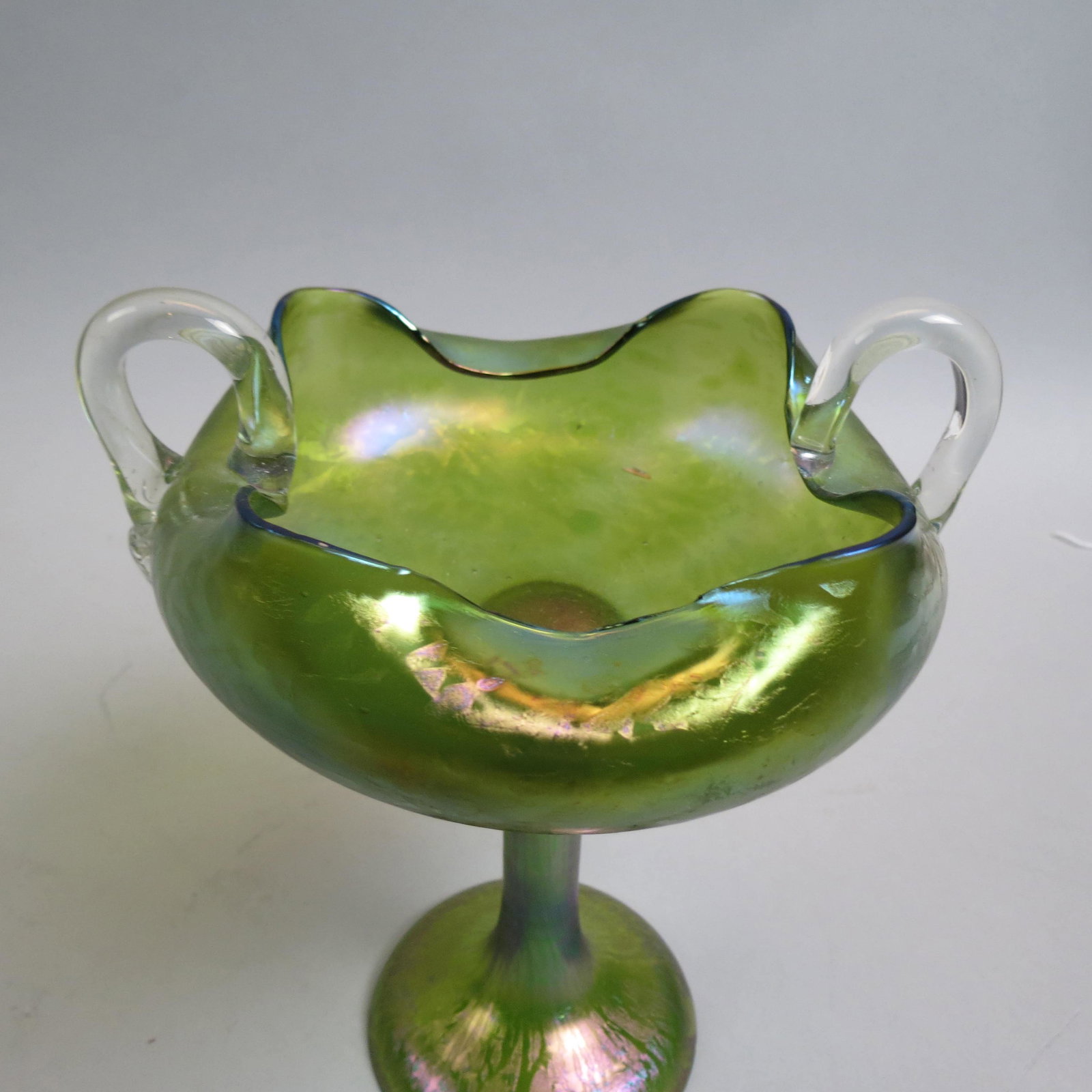 Loetz Austria Art Glass Compote,: floraform top with clear handles, tall pedestal base, 6" diameter, 8" tall, unsigned, excellent................Loetz was the premier Bohemian art glass manufacturer during the Art Nouveau period (or J