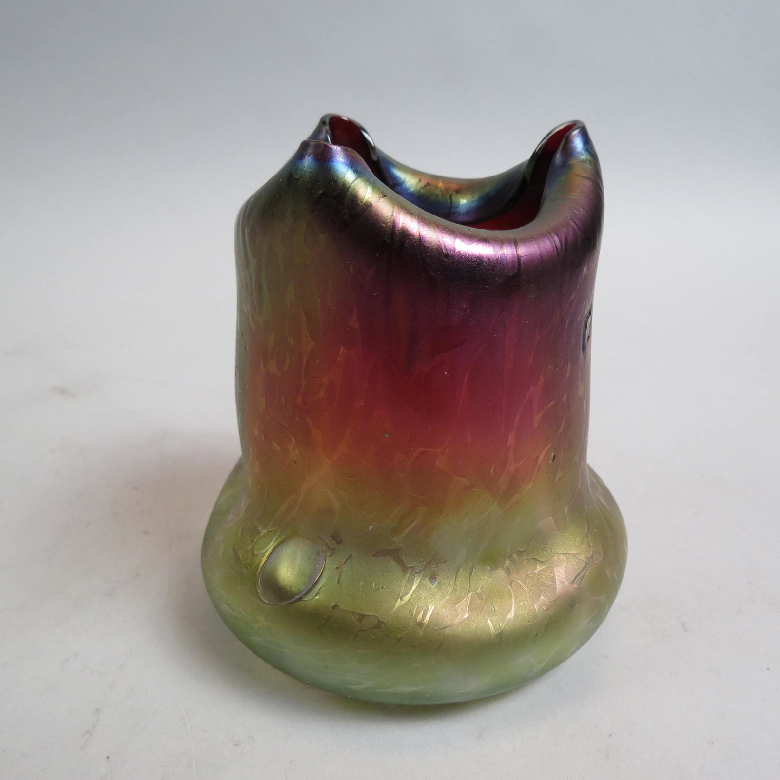 Loetz Austria Art Glass Vase,: iridescent butterfly texture on green to amethyst fold in top design, 5 1/2", unsigned, excellent.