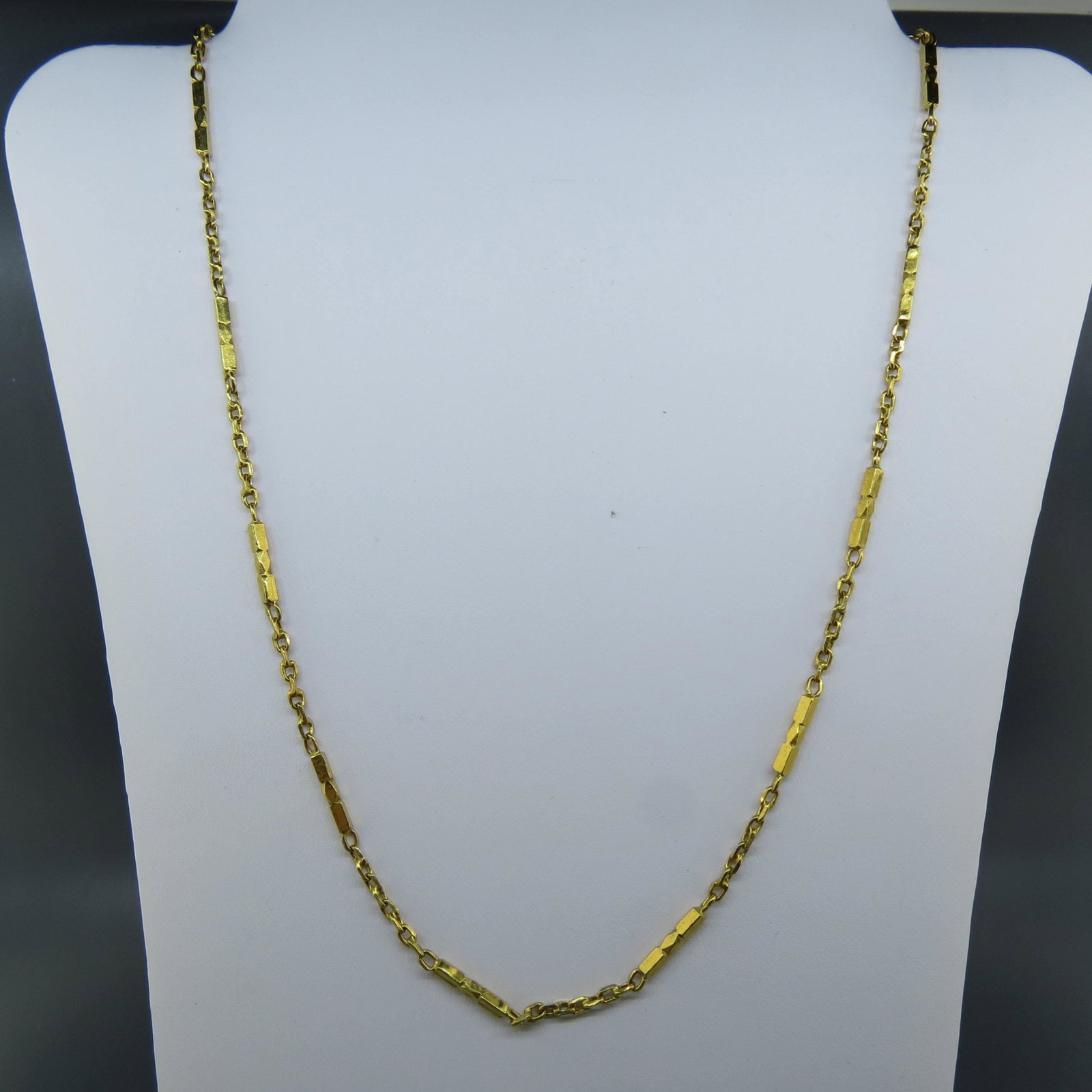 Chinese 24K Gold Baht Type Necklace,: link and bar style, signed, 18" long, 18 grams.............In Thailand Thai "Baht" gold chains are still made by hand. ... Each chain is made of gold that is of 96.5% purity (a little over 23K). Thai 