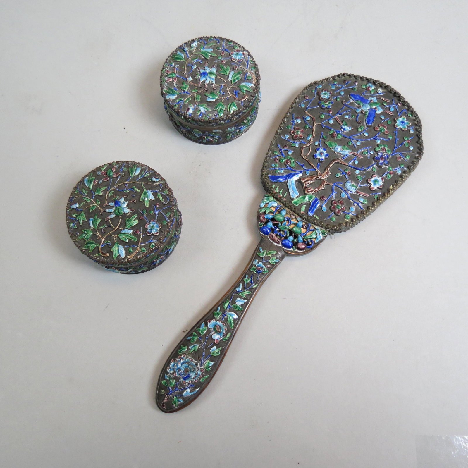 Chinese Enameled Dresser Boxes & Hand Mirror,: pair of 3" round boxes and an 11 1/2" long hand mirror with butterfly and floral designs, excellent.