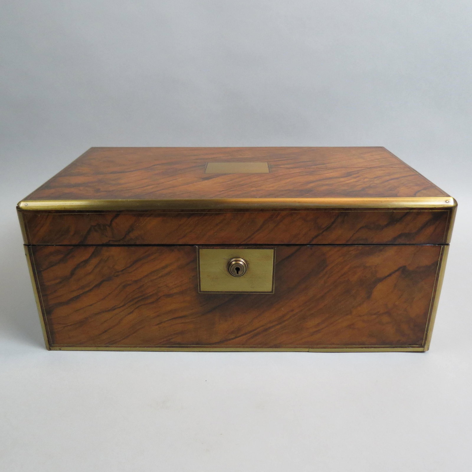 Antique Wooden Travel or Lap Desk,: brass beveled trim, tooled leather writing surface, inner compartments, 10" x 7 1/2" x 7 1/2".