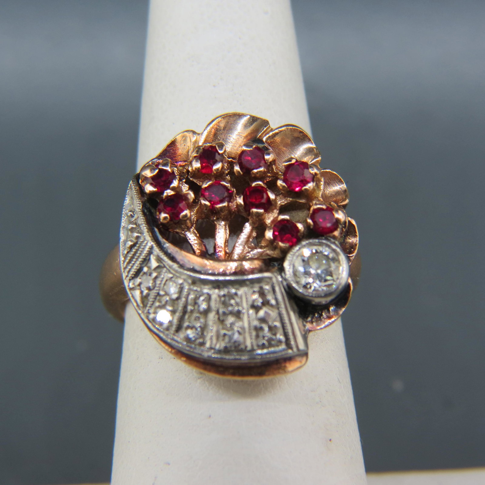 Ruby & Diamond 14K Rose Gold Retro Ring,: 9 round rubies totaling .50 carat and 9 round diamonds totaling .25 carat in 14K rose gold with appraisal of $2,150.00, currently size 7.