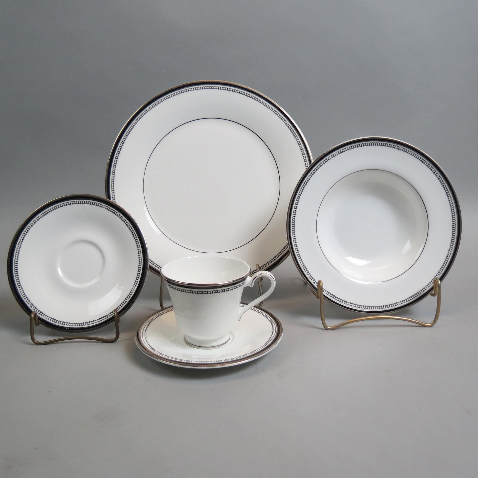 111 pc. Royal Doulton "Sarabande" China Service,: pattern H-5023, includes 16 dinner plates, 2 luncheon plates, 29 salad plates, 12 bread and butter plates, 5 cream soups with 5 underplates, 15 cups with 15 saucers, 6 soup bowls, teapot, 2 open sugar