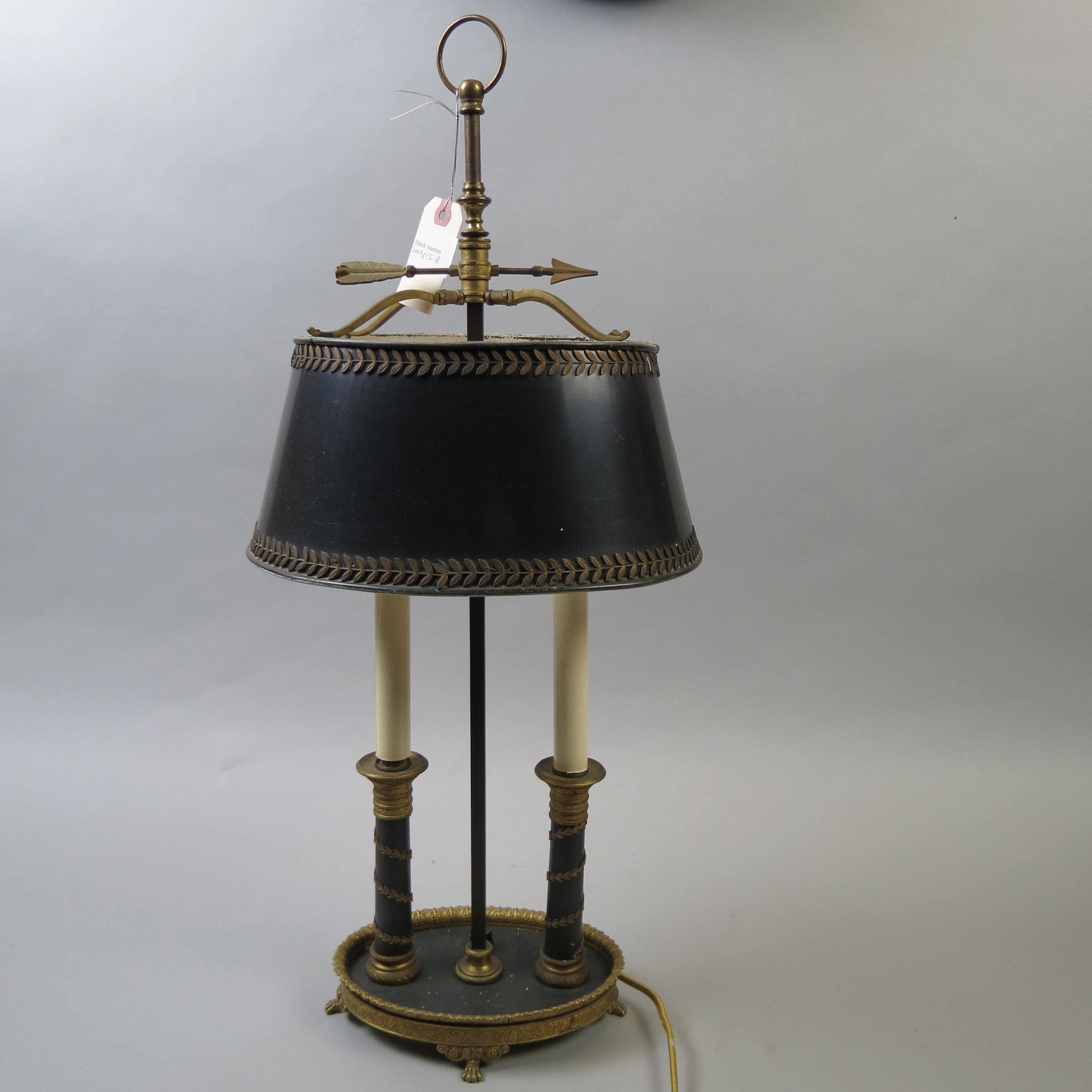 French Period Bronze & Tin Lamp,: double candlestick oval footed base, fine ormolu, leaf decorated shade, arrow top, center handle. 26" tall, 11" wide, 9" diameter shade.