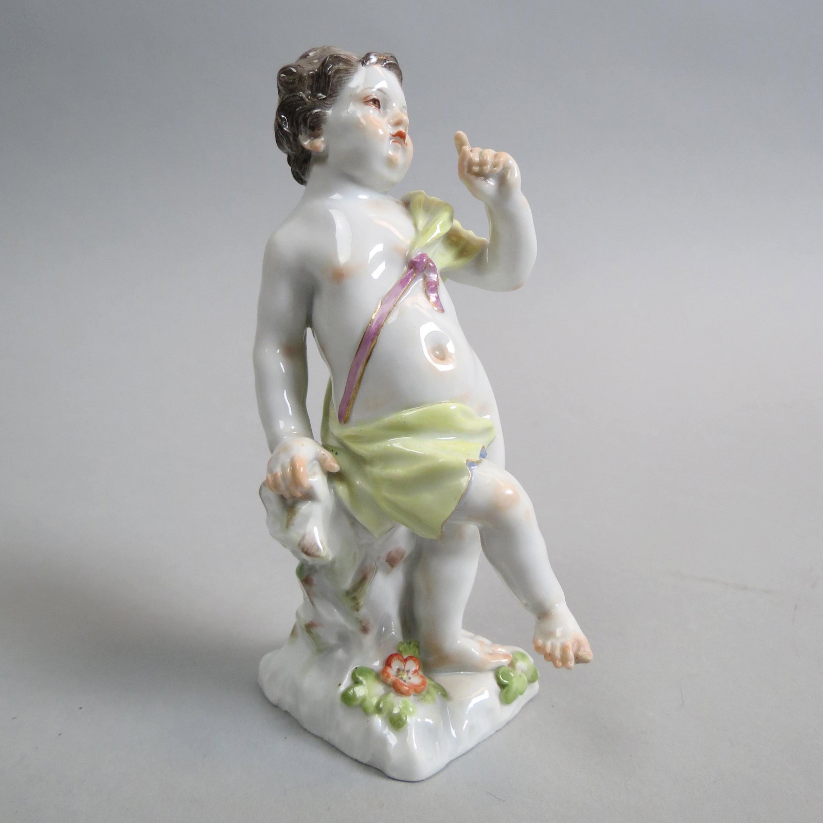 Meissen Porcelain Figurine Child or Putti,: at play, yellow cloth draped on shoulder, 4 1/2", #1267, crossed swords mark, excellent.