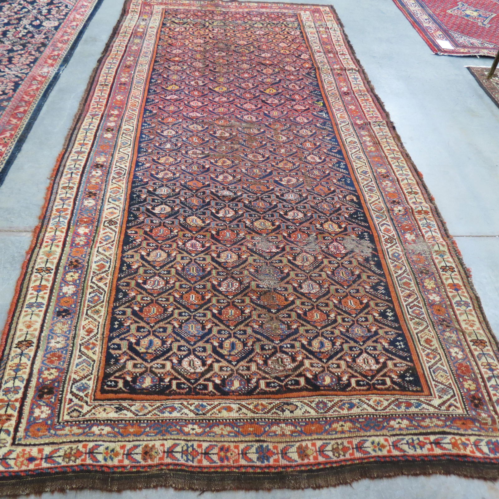 Antique Caucasian Persian Handmade Rug,: overall geometric and stylized florals on indigio field, 4'9" X 10'4".