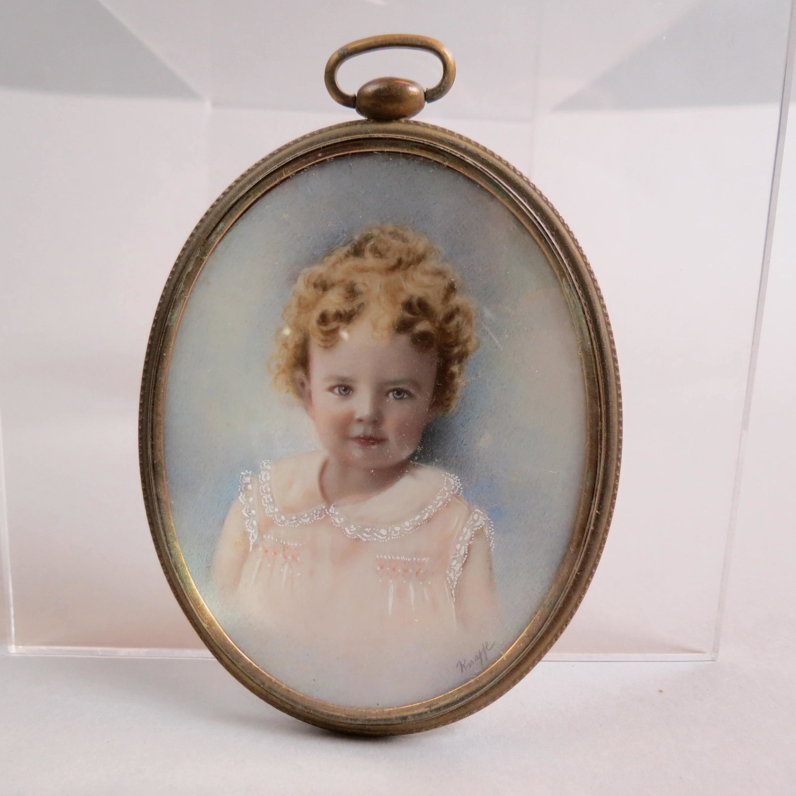 Miniature Painting of a Young Girl Signed,: oval image area 2 1/2" x 3 1/4", very fine quality.