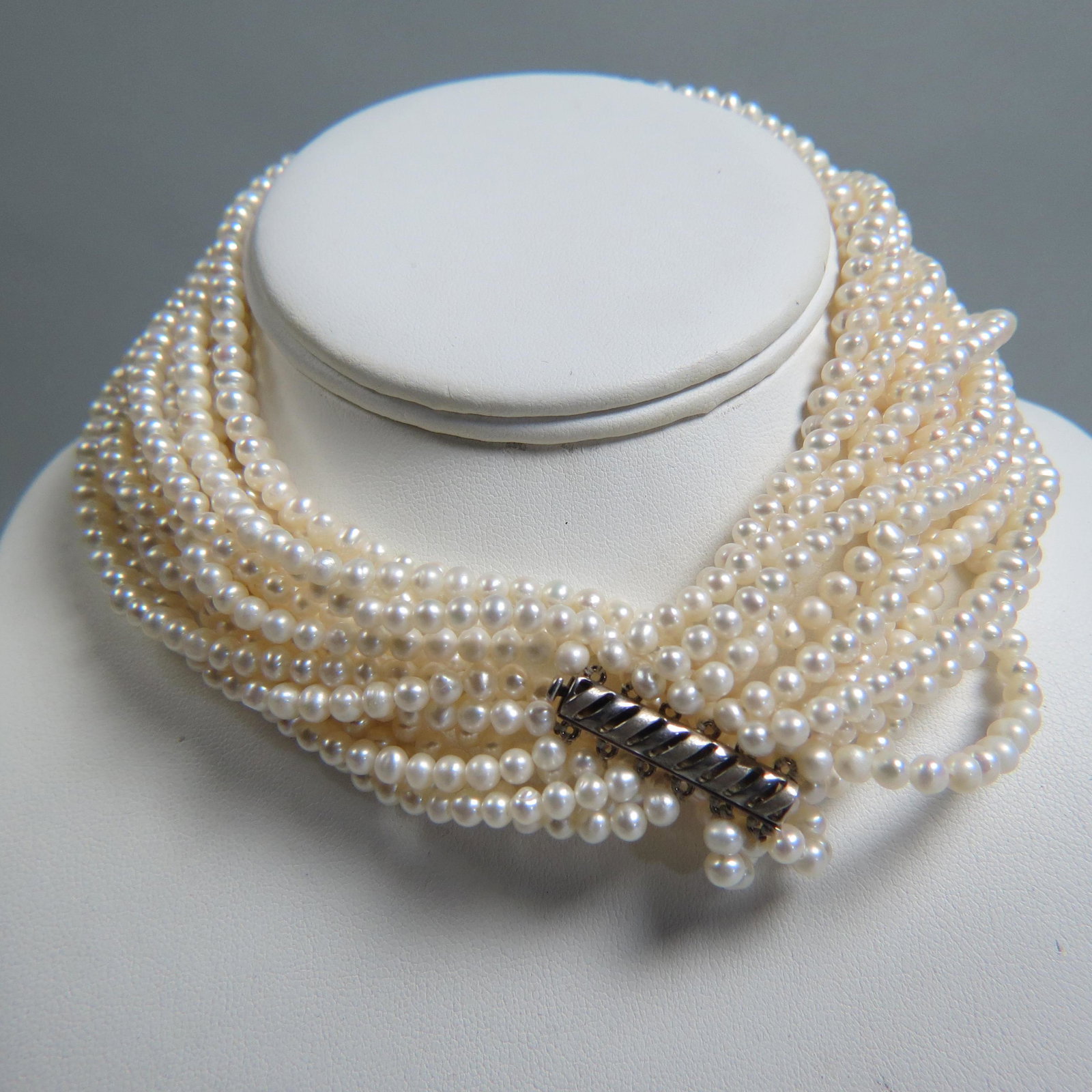 Pearl Necklace, 14 strands,: 3mm, 15" long, sterling clasp.