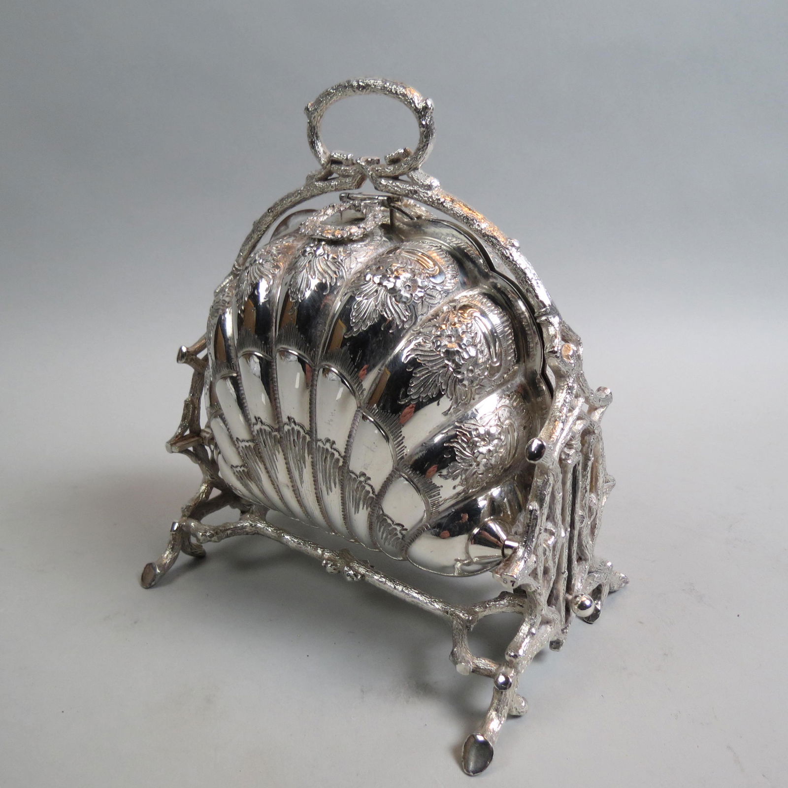 English Silverplate Mechanical Biscuit Box,: shell and branch design, fold open, center handle, 10" tall, excellent.