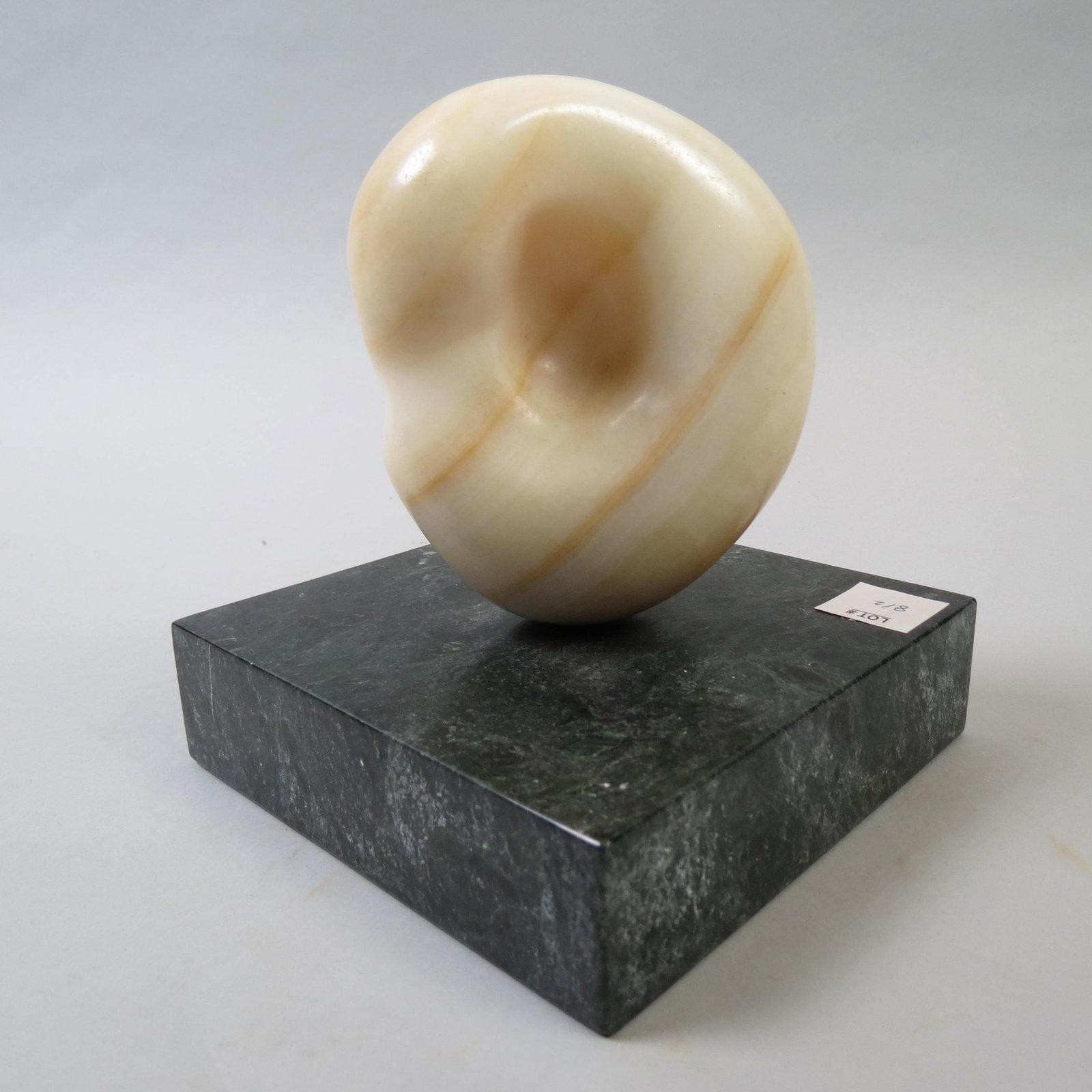 Jane Ullman, sculpture,: carved white and brownish onyx on black marble base, 5" plus base, unsigned.....Biography from Crocker Art Museum StoreSculptor. Born in Fort Wayne, IN on June 5, 1908.Jane Fisher grew up in Chicago a