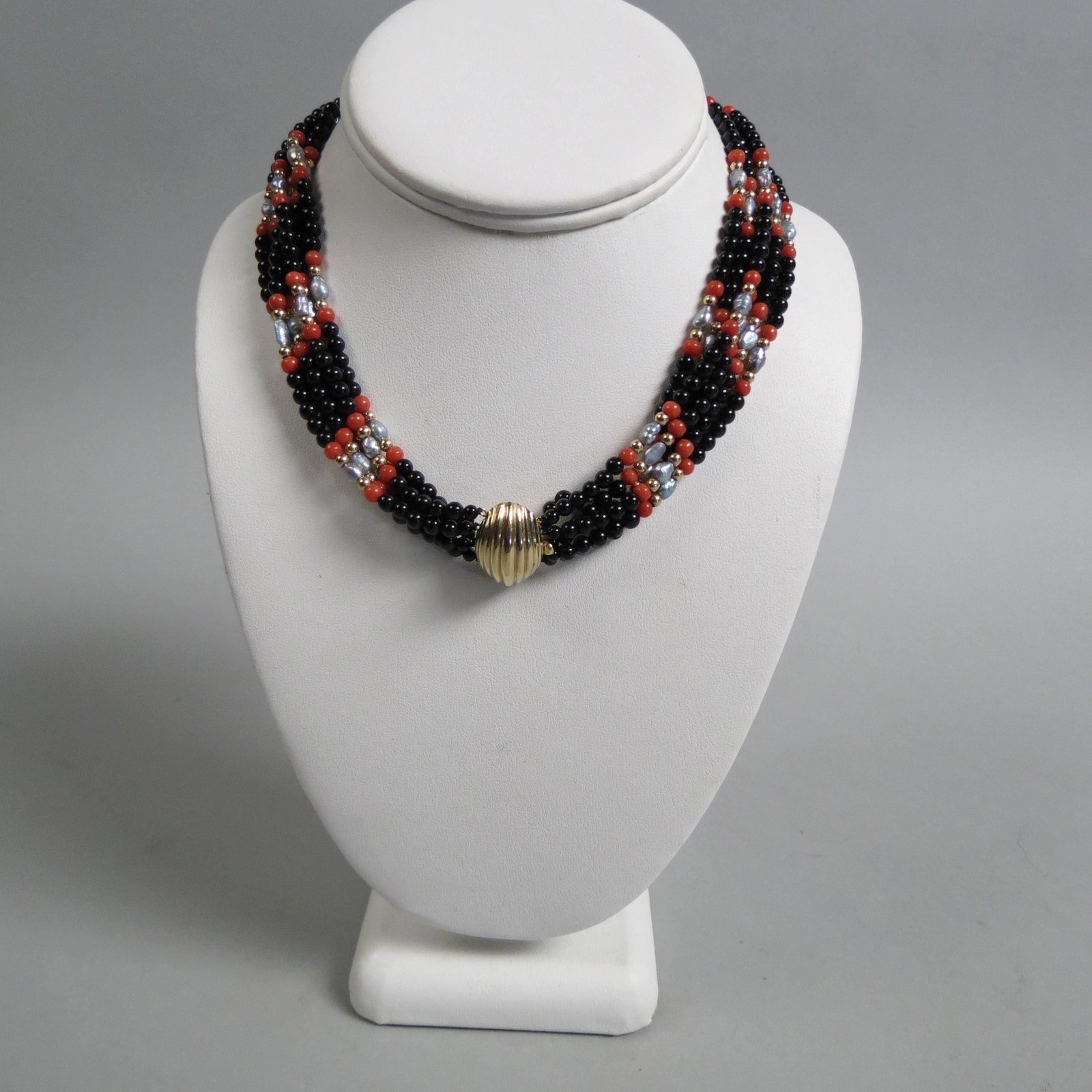14K Gold, Pearl, Coral & Black Onyx Necklace: six strands of beads, silver grey pearls, beads are 4mm, dome 14K yellow gold clasp, 16 1/2"