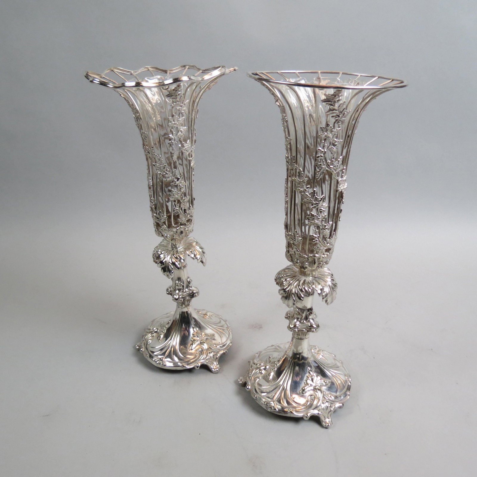 Pair of Silverplate Vases,: hallmarked, footed, similar wirework tops with replaced glass inserts, 14 1/2" tall, 19th century.