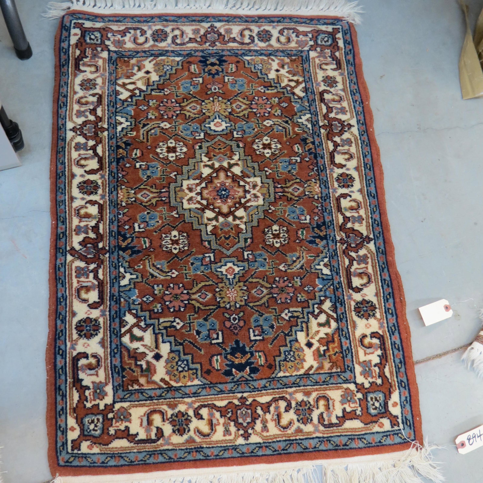 Hamadan Persian Handmade Mat,: stylized floral on brown field, 2' X 3'.
