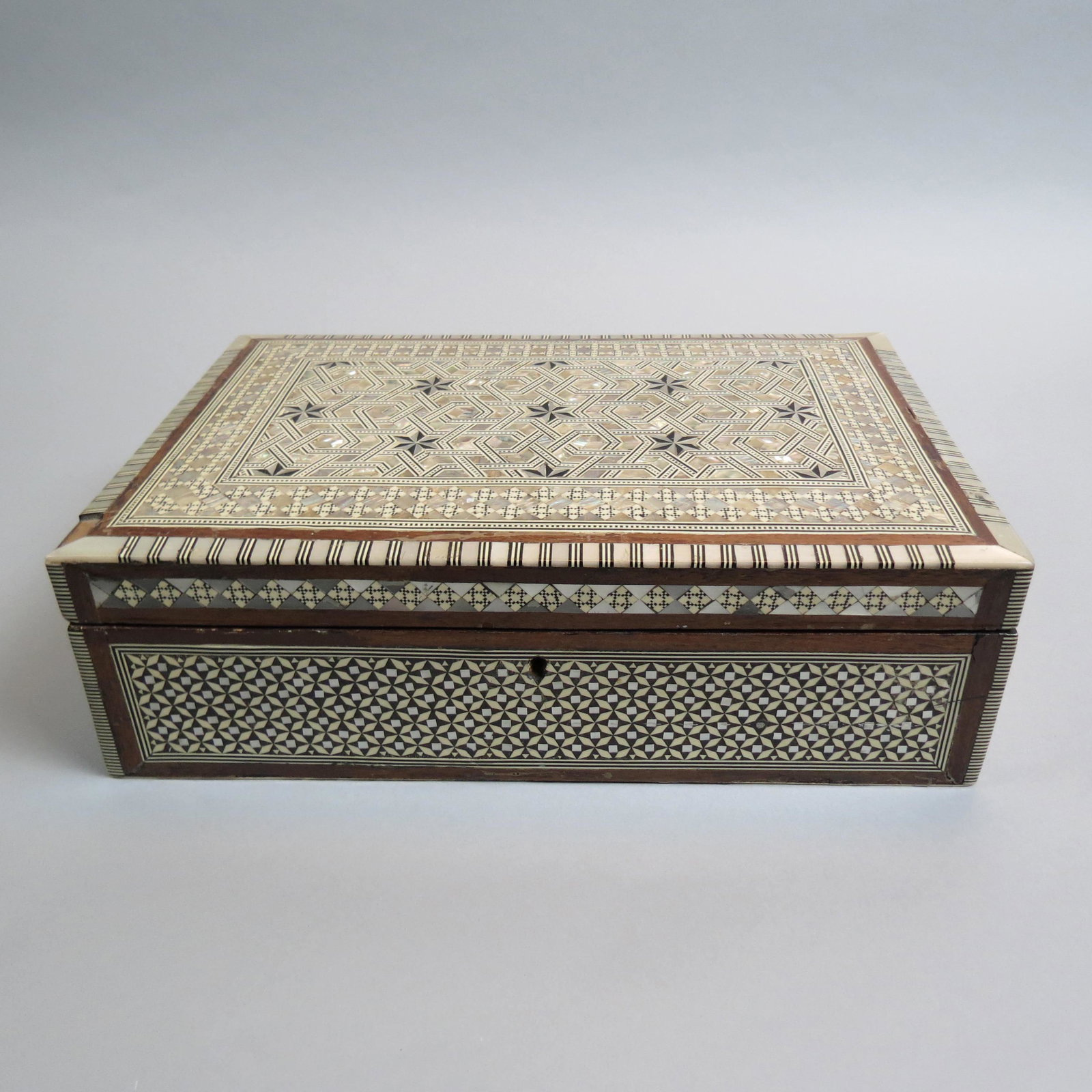 Moroccan Inlaid Wooden Box,: with mother-of-pearl, ebony and bone inlays, hinged, 9 1/2" X 14" X 4 3/4".