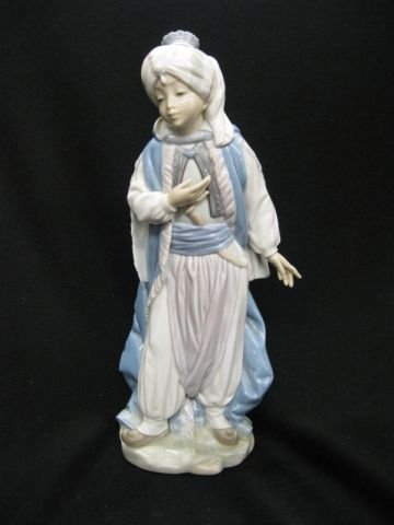 Lladro Porcelain Figurine of a Young Genie, : 11 1/2" tall, excellent.