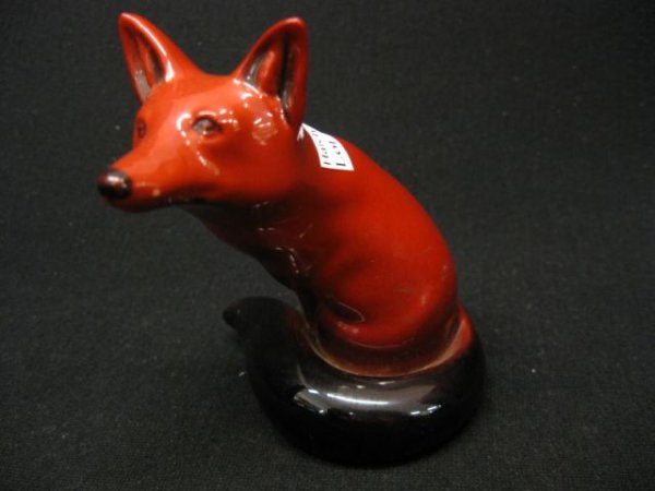 Royal Doulton Flambe Porcelain Figurine of a Fox,: seated, 4 1/4" tall, excellent.