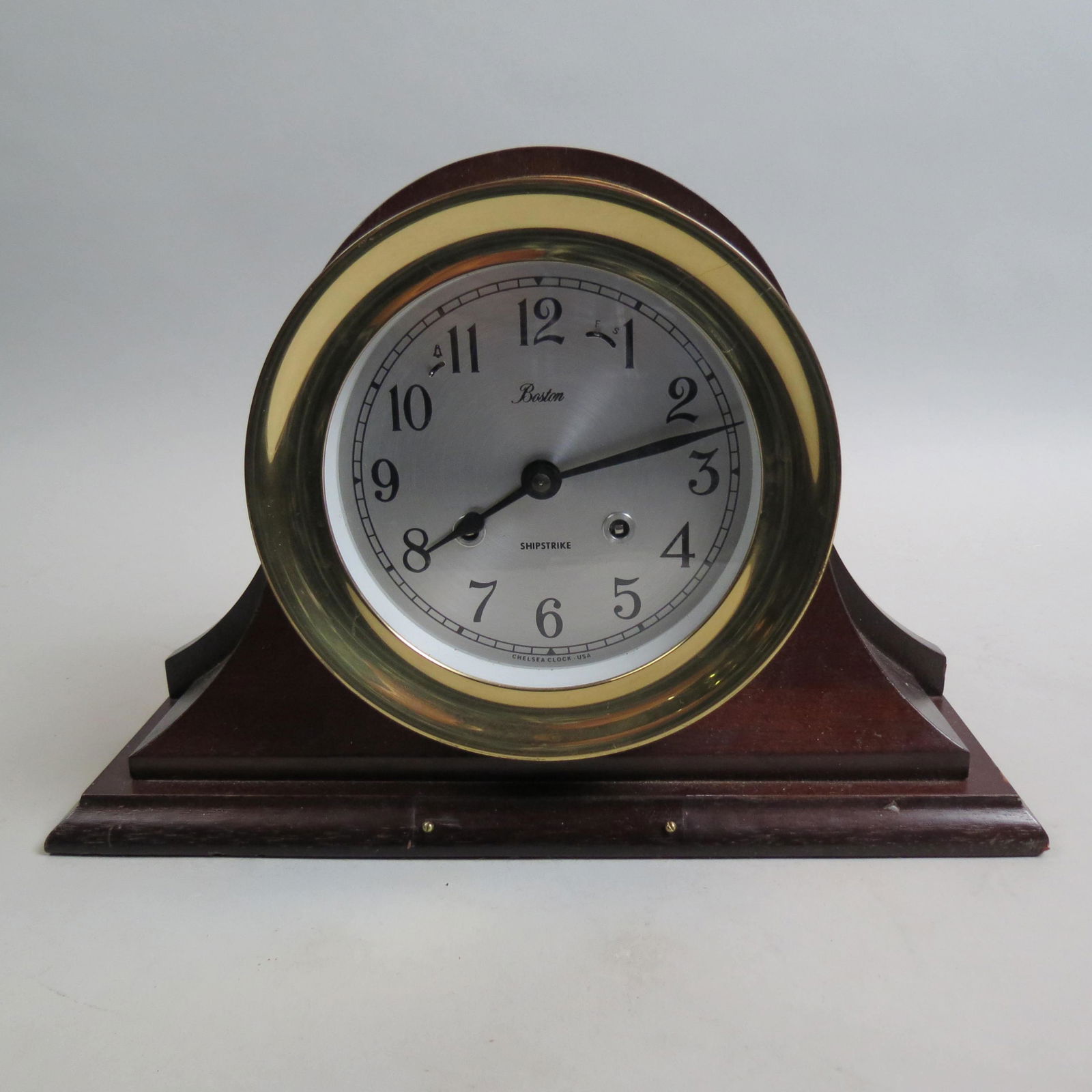 Chelsea Ship: 7" brass case on wooden base, "Shipstrike" model, working......Incomparable Timepiece: The Chelsea Ship's Bell ClockThe Chelsea Clock Ship's Bell clock is among the most distinguished timepieces avail