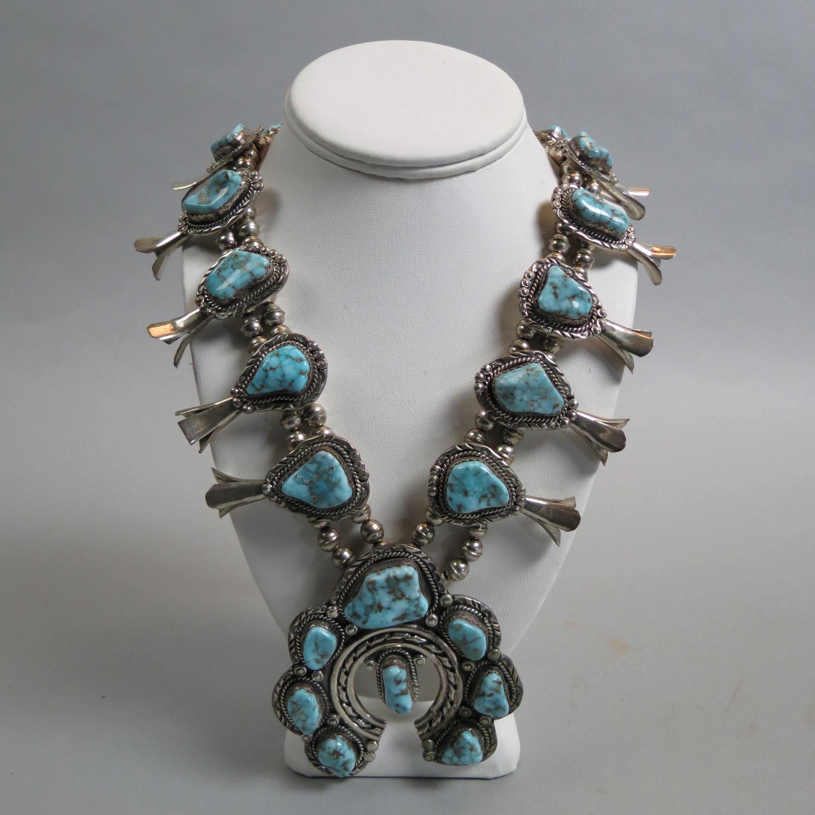 Navajo Turquoise Sterling Squash Blossom Necklace,: signed NE, twenty rich stones, 30" long plus the Naja pendant, 248 grams, a beauty!