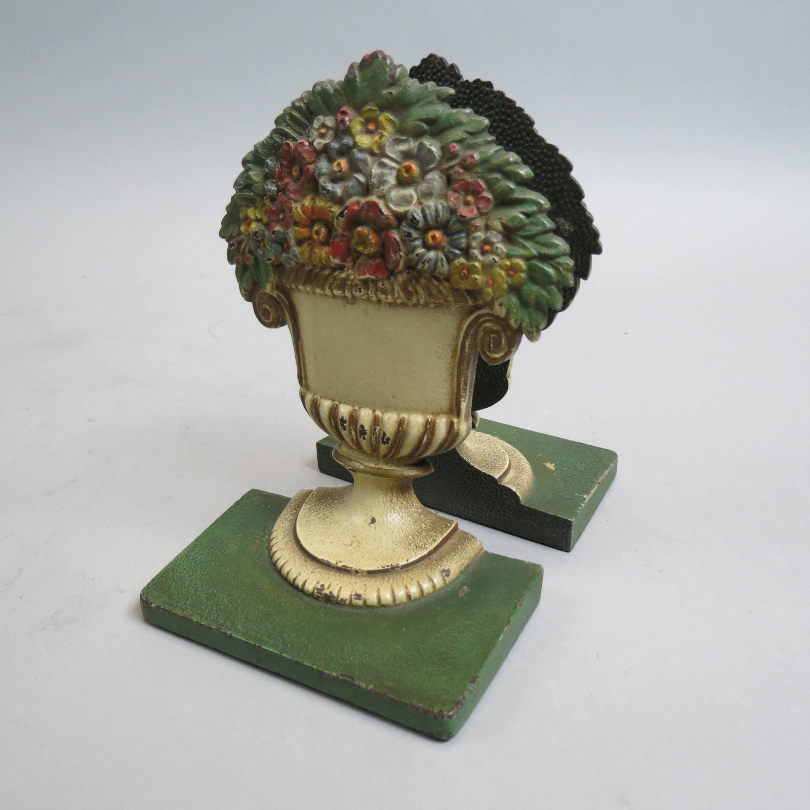 Bradley & Hubbard Cast Iron Bookends,: flowers in urn, original paint, 5 1/2", signed.