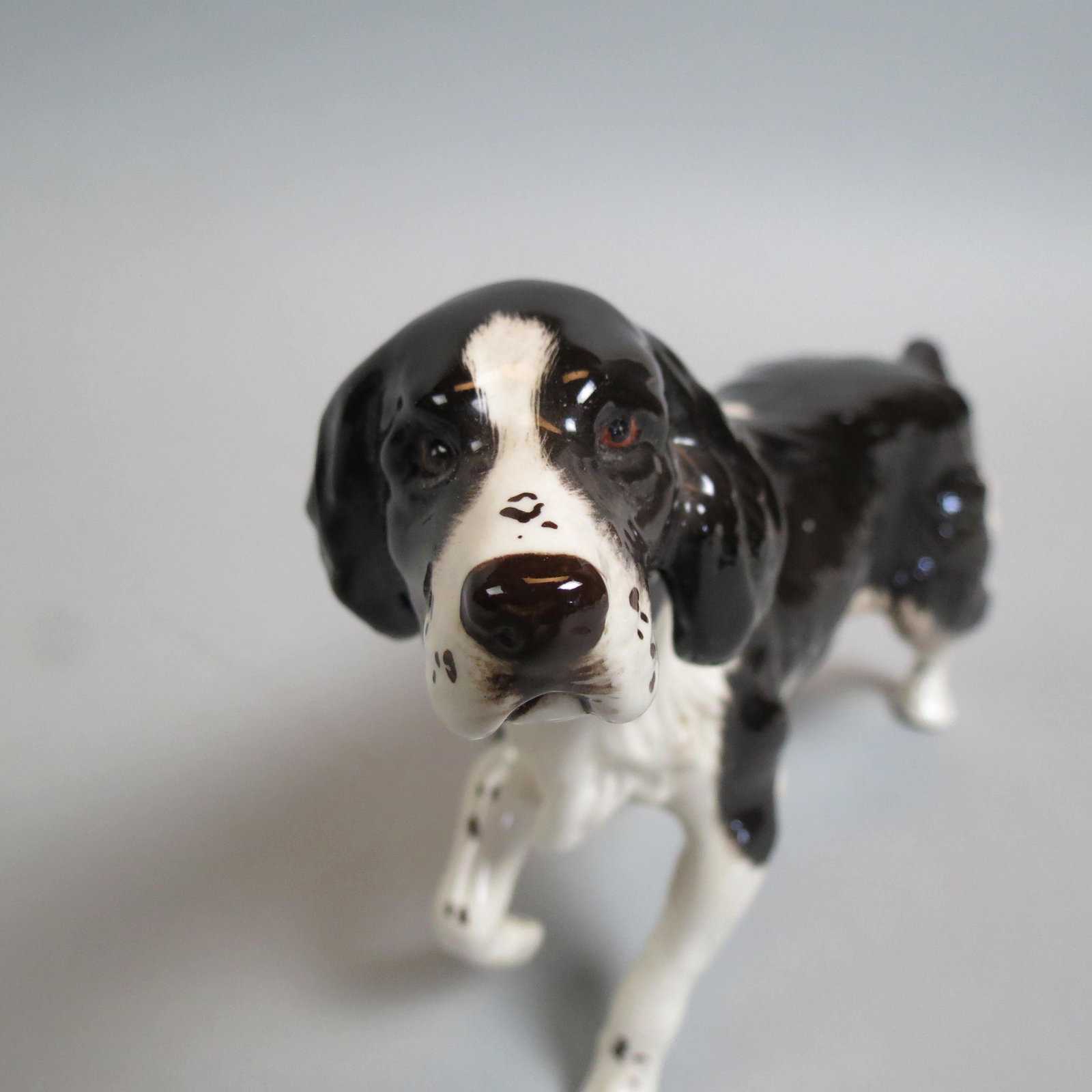 Royal Doulton Figurine of a Britney Spaniel,: 5 1/4" x 7", excellent.