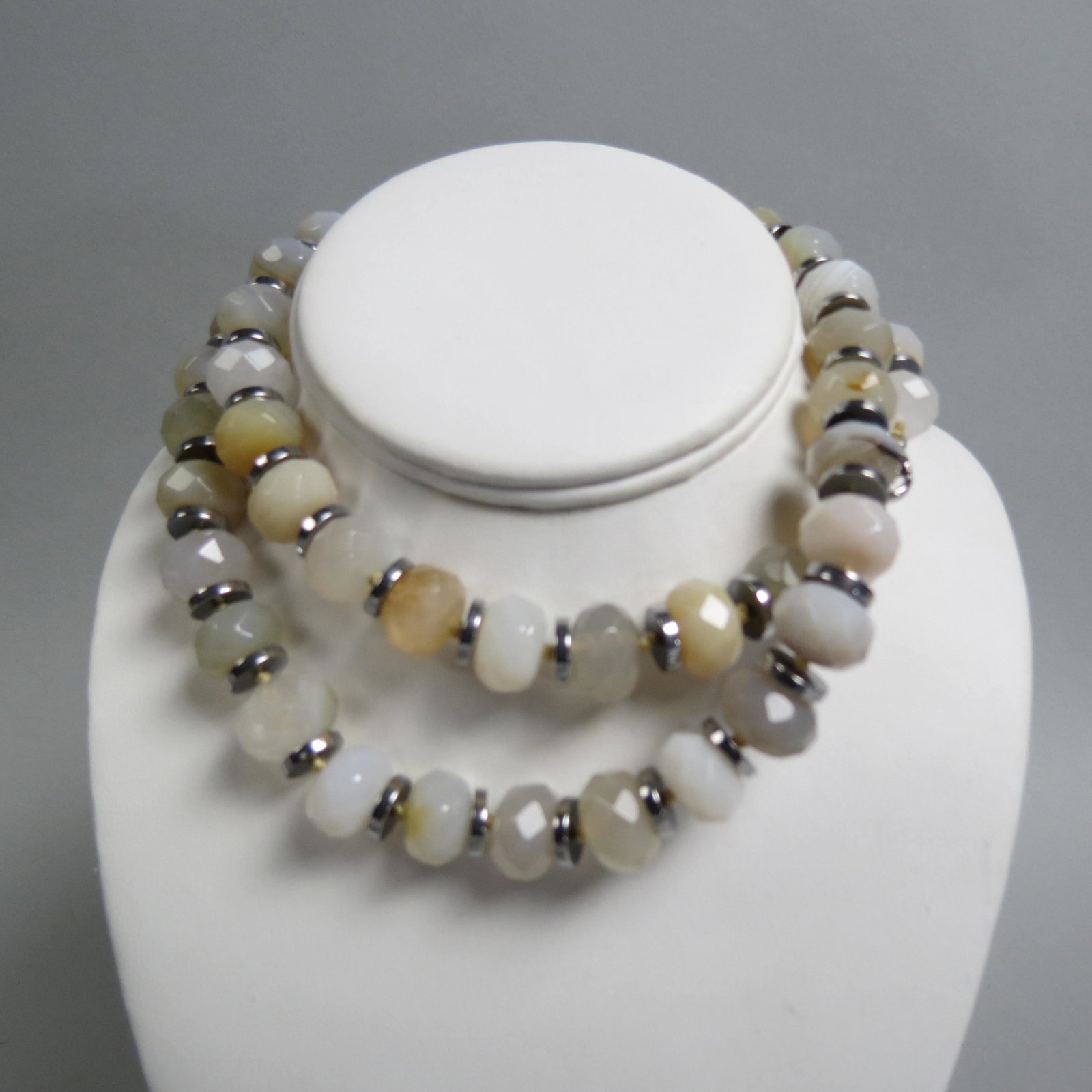 Agate Bead Necklace,: faceted beads measuring approx 14mm, sterling clasp, 26" long.