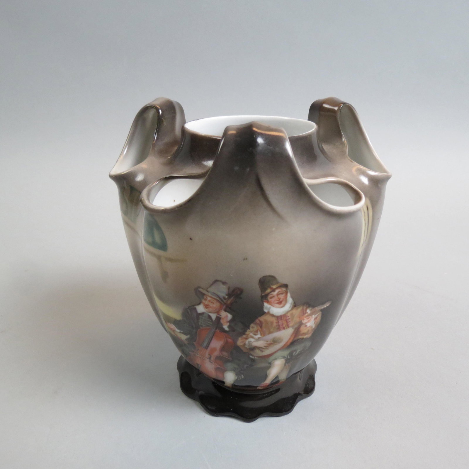Royal Bayreuth Porcelain Vase "Musicians",: multi opening top design, 6 1/2", signed, excellent....Royal Bayreuth is the name of a factory that was founded in Tettau, Bavaria, in 1794. It closed in 2019. The marks have changed through the years
