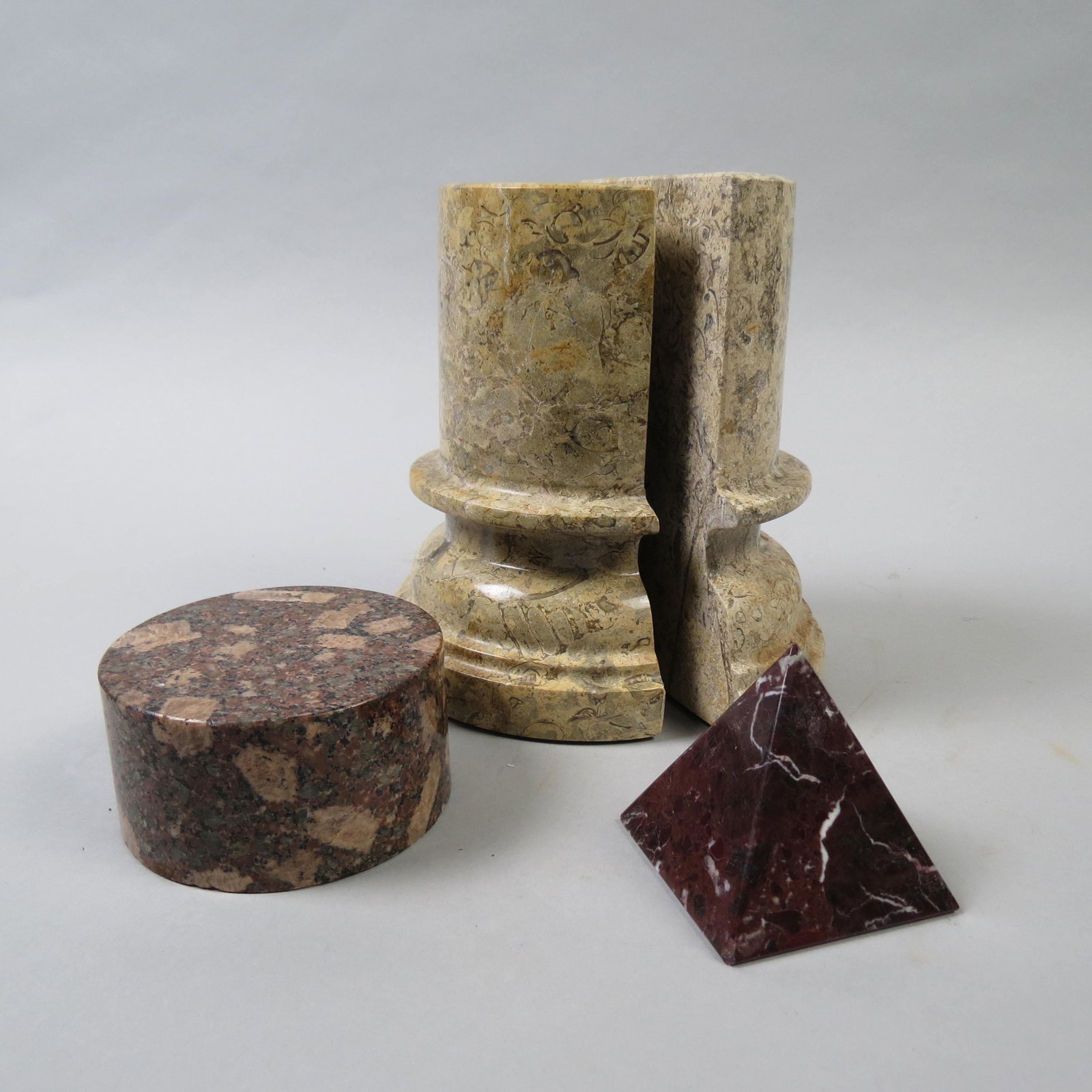 3 Stone Items including Pair of Bookends,: in column design , 6 3/4" tall, pyramid and round disc paperweights.