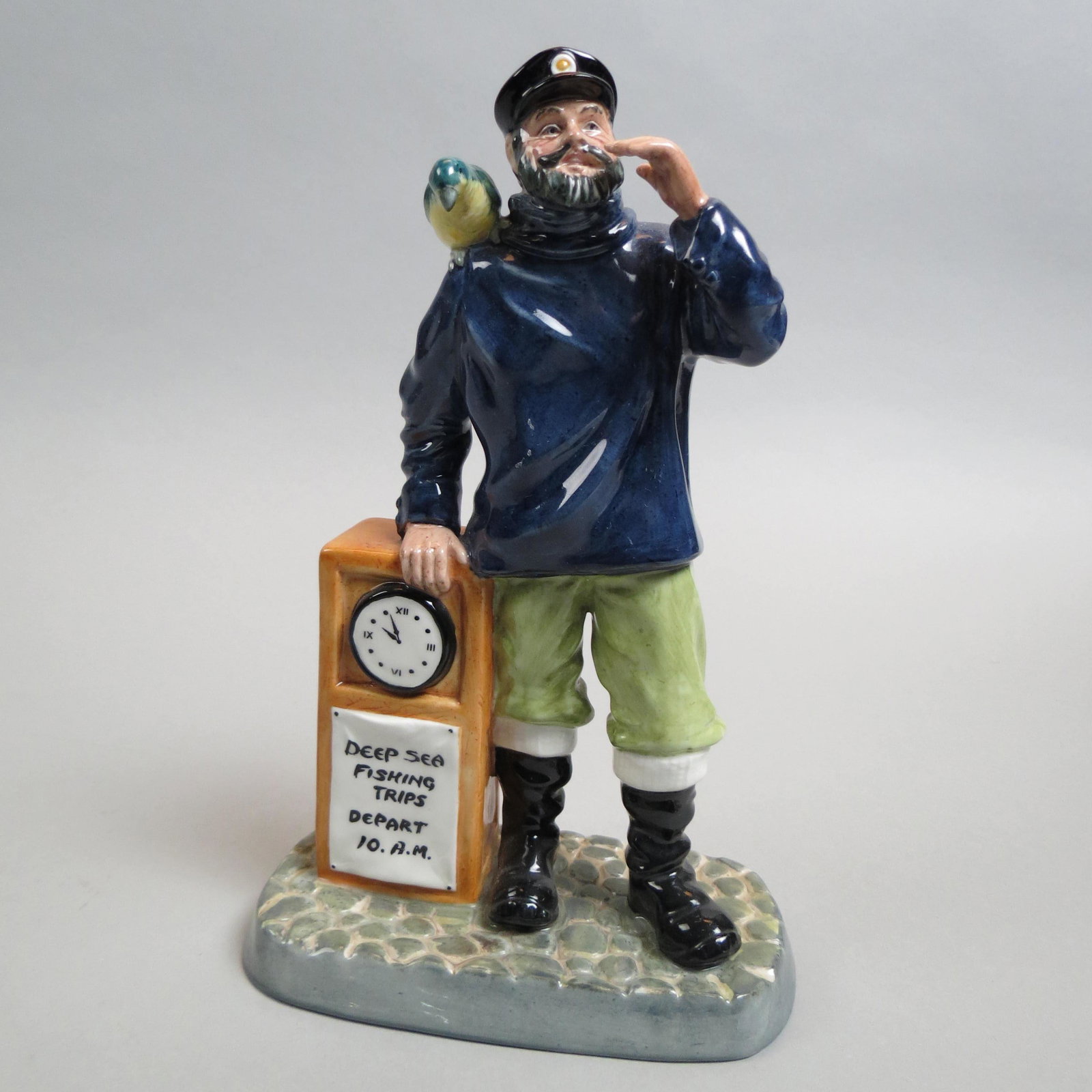 Royal Doulton Figurine "All Aboard",: HN-2940, designed 1982 by R. Tabbenor, 9 1/4", excellent.
