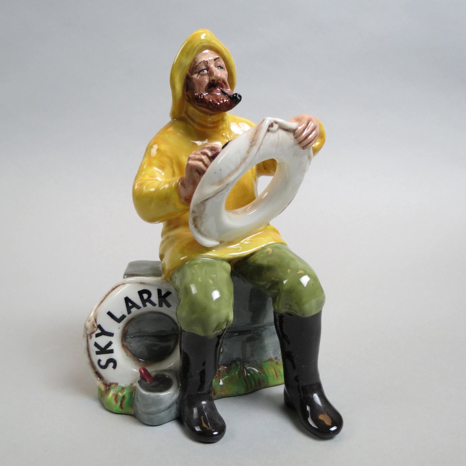 Royal Doulton Figurine "The Boatman",: HN-2417, Skylark edition, designed by M. Nicoll, 1971, 6 1/2", excellent.