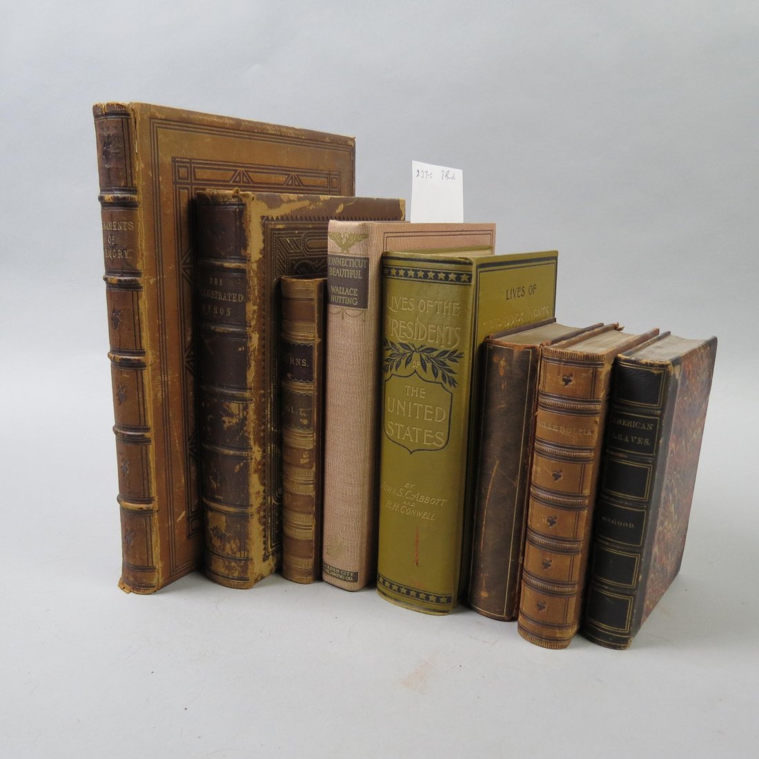 8 Antique Books;: includes "Foster's Complete Hoyle" 1927, "Milleducia" 1857, "American Leaves" 1867, "Lives of the Presidents of the United States of America". "Illustrated Byron" circa 1880, "Beautiful Connecticut by